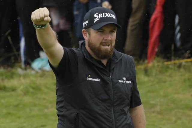 Ireland's Shane Lowry celebrates after his birdie at the 10th hole during the second round of the British Open Golf Championships at Royal Portrush today.