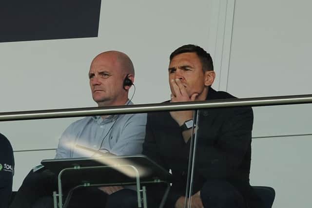 Leeds Rhinos' Richard Agar and Kevin Sinfield watch the clash against Hull on Sunday from the Headingley stand. Picture: Tony Johnson.