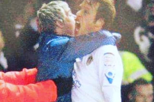 Scaz pictured in the Daily Mirror celebrating a goal with Luciano Becchio at Elland Road.
