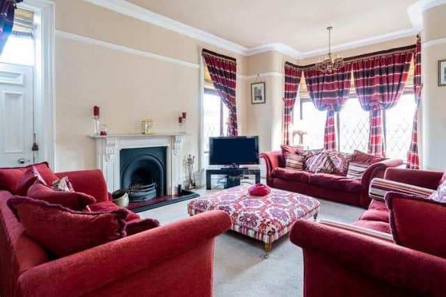 It has a stone mullion bay window enjoying a view of the grounds.