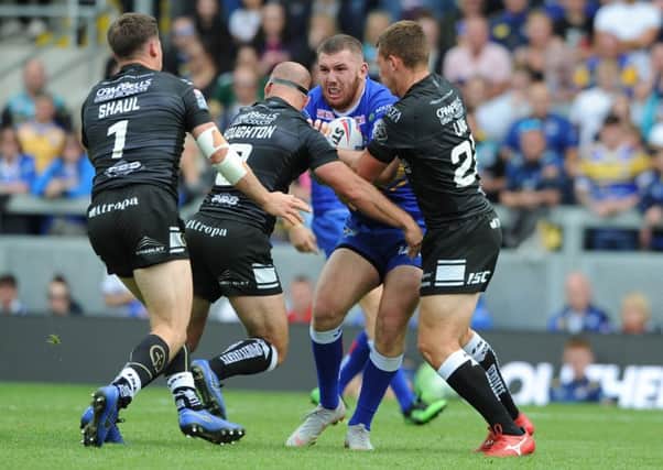 Cameron Smith in action against Hull FC.   Picture: Tony Johnson.