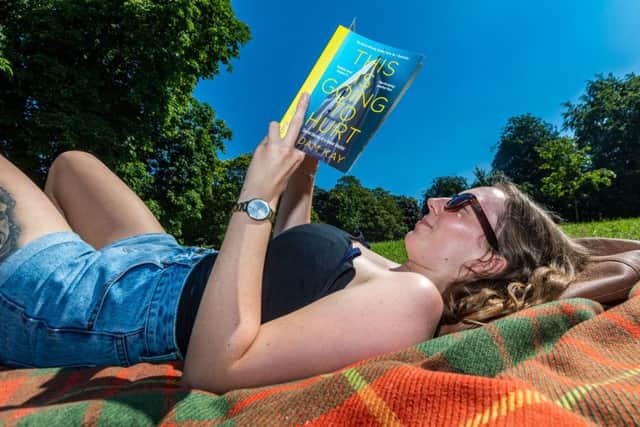 Date:23rd July 2019.Picture James Hardisty.Heatwave across the UK with forecaster predicting the temperatures are expected to hit 37C (98.6F) in South East England. Pictured  paige Palmer, aged 25, from Australia, now working in Harrogate takes time out to enjoying the warm weather relaxing on The Stray in the centre of Harrogate.