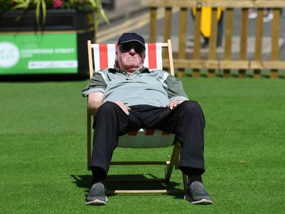 Relaxing in the hot weather in Leeds City Centre.