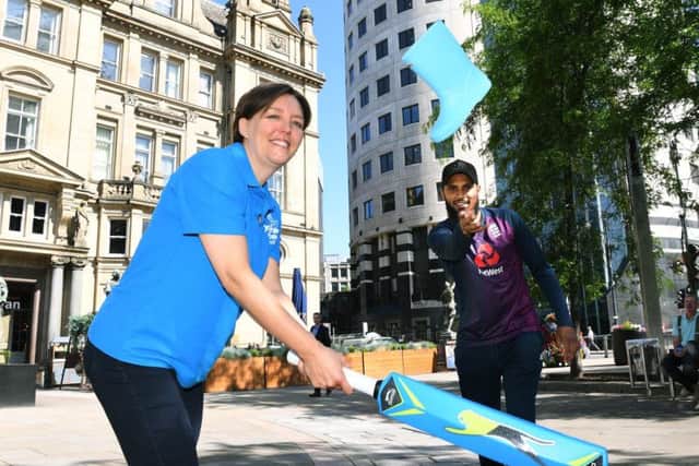 Yorkshire and England cricketer Adil Rashid joins Yorkshire Cancer Research chief executive Dr Kathryn Scott to launch the Give it Some Welly campaign. Picture: Jonathan Gawthorpe