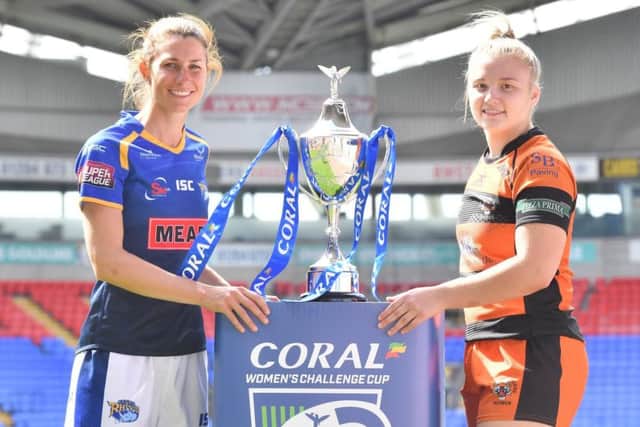 Leeds Rhinos' Courtney Hill and Castleford Tigers' Georgia Roche with the Challenge Cup.
