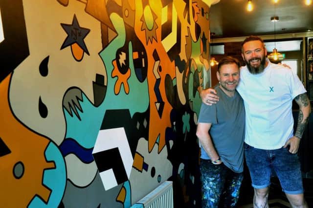 Artist Nicolas Dixon and chef Matt Healy, in the new entrance hall at The Beehive x Thorner.