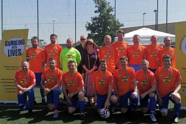 Headingley AFC in their new kits sponsored by Gambling With Lives charity, with charity founders Charlie and Liz Ritchie.