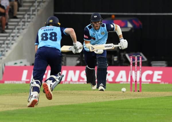 Yorkshire's David Willey chalks up the runs with Harry Brook against Lancashire. (
Picture: Jonathan Gawthorpe)