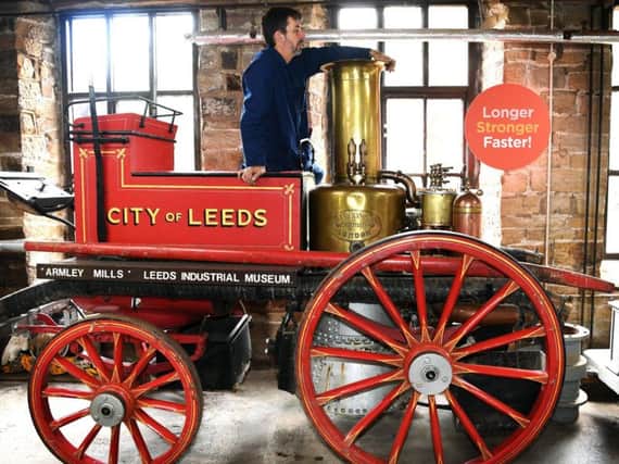 Engineer Andrew Bodley polishing a steam powered City of Leeds fire engine from 1891 ahead of the opening of the new Leeds Industrial Museum exhibition. Picture: Jonathan Gawthorpe