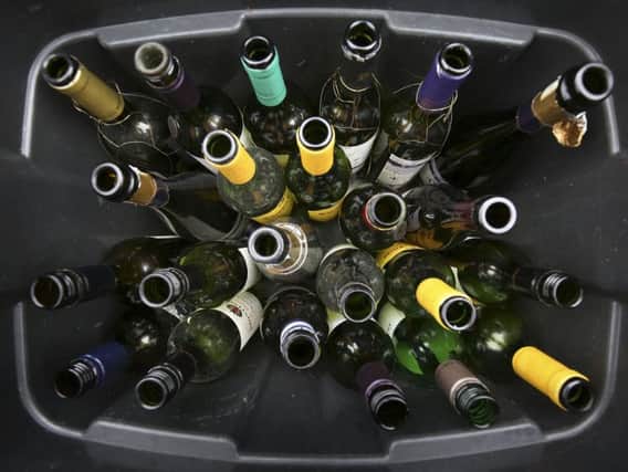 A recycling bin of empty wine bottles. PIC: PA