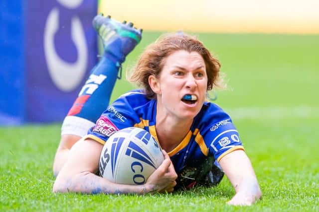 Leeds Rhinos' Courtney Hill dives over for her side's decisive try against Castleford Tigers.