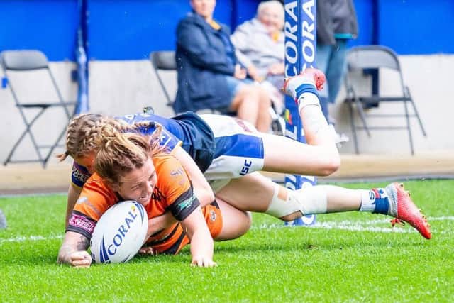 Castleford's Rhiannon Marshall touches down to score against Leeds.