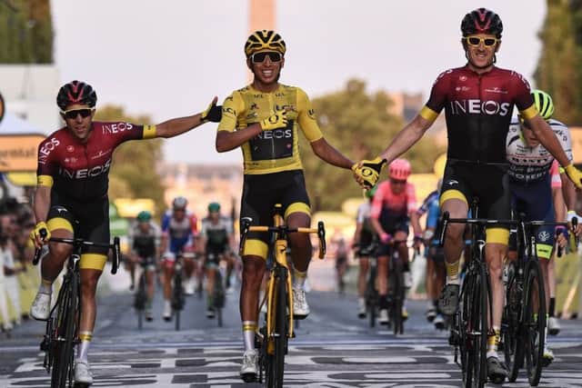 OVER THE LINE: Spain's Jonathan Castroviejo, left, and Great Britain's Geraint Thomas, right, congratulate Colombia's Egan Bernal as he celebrates his victory in the Tour de France. Picture: ANNE-CHRISTINE POUJOULAT/Getty Images
