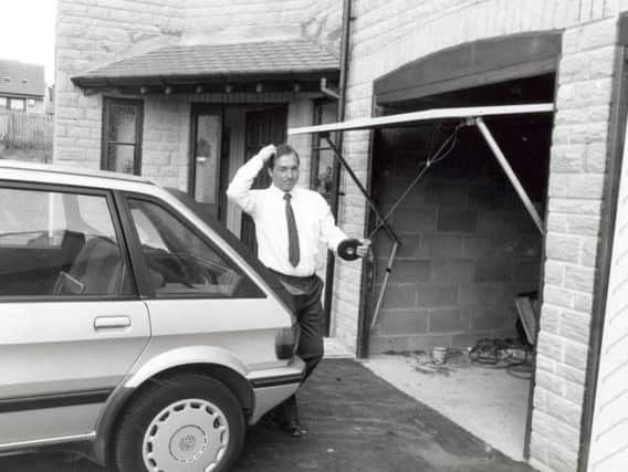 Chris Seekins and his garage in June 1989. PIC: YPN