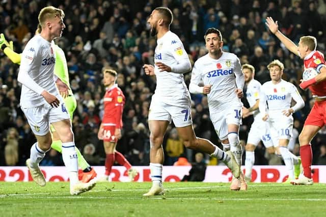 A free kick will be awarded if the ball goes into the goal after touching an attacking players hand/arm even if accidental.