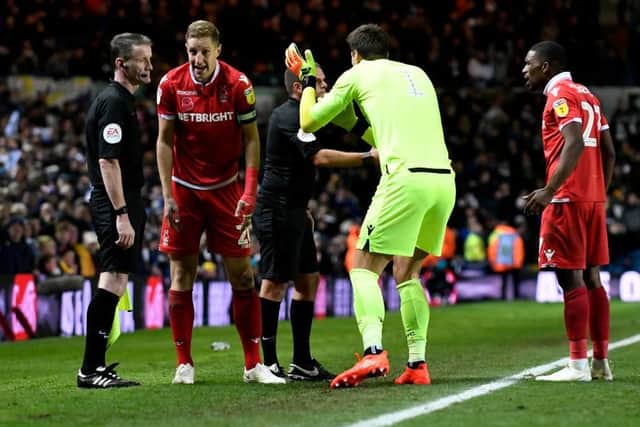 A free-kick or penalty WON'T be awarded if a player is falling and the ball touches their hand/arm when it is between their body and the ground to support the body, but not extended to make the body bigger.
