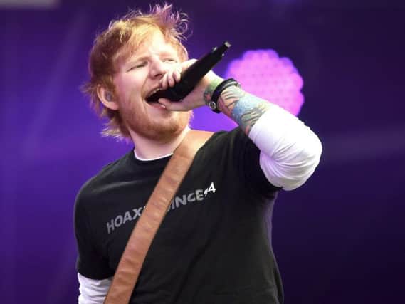 Ed Sheeran performing (Credit: Ben Birchall/PA Wire)