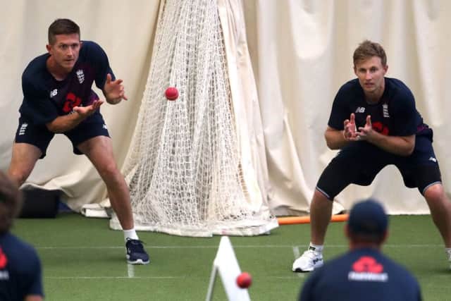 England's Joe Denly and Joe Root (right) take part in catching practice during the nets session at Edgbaston.