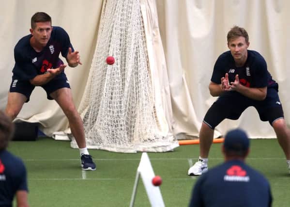 England's Joe Denly and Joe Root (right) take part in catching practice during the nets session at Edgbaston.