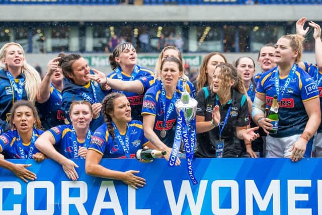 Leeds Rhinos women celebrate their Challenge Cup victory over Castleford.