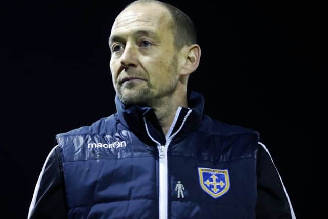 Guiseley's joint manager Russ O'Neill.