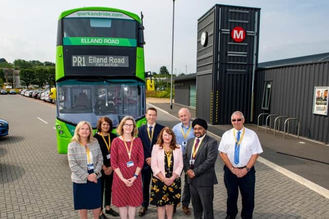 Coun Lisa Mulherin and Coun Kim Groves (centre) joined by Connecting Leeds partners from Leeds CC, West Yorkshire Combined Authority, First Buses and Bam Nuttall.
