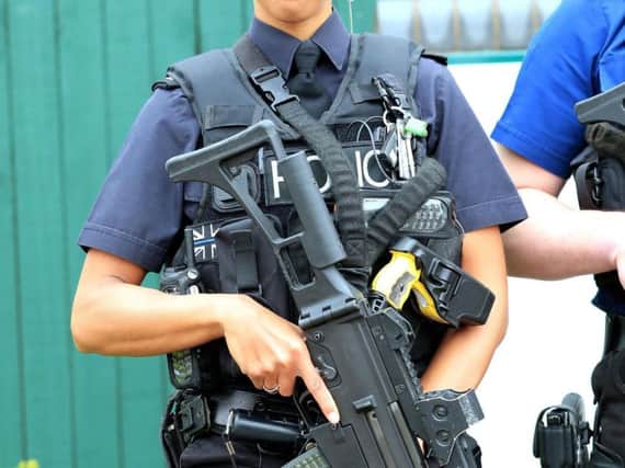 Stock image of female armed officer. Picture: PA