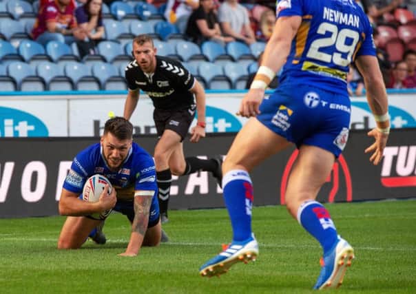 Tom Briscoe touches down against Huddersfield Giants.