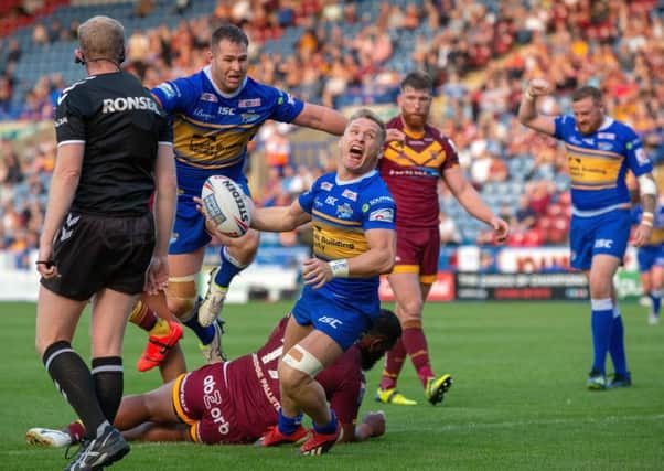 Brad Dwyer celebrates scoring against Huddersfield Giants.