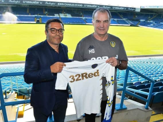 Leeds MD Angus Kinnear says owner Andrea Radrizzani, left, remains committed to the 'five year plan'