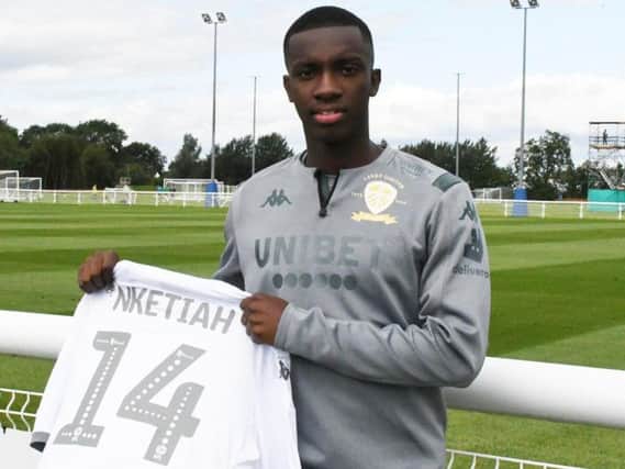 EXCITED: New Leeds United recruit Eddie Nketiah with the no 14 shirt he will wear on loan from Arsenal.