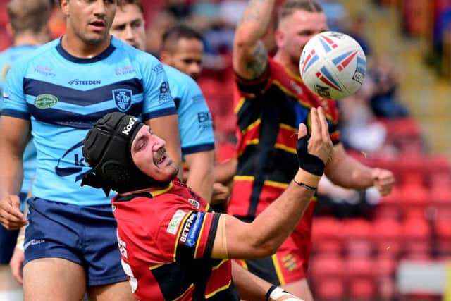 Michael Knowles celebrates scoring for Dewsbury against Featherstone last weekend.
