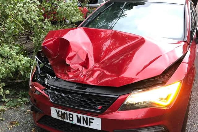 James Allison's car shortly after a tree smashed through the bonnet.