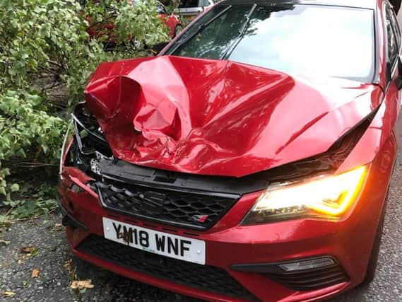 James Allison's car shortly after a tree smashed through the bonnet.