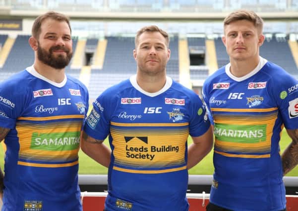 Leeds Rhinos' Adam Cuthbertson, captain Trent Merrin and Liam Sutcliffe sporting the Leeds Building Society-sponsored jersey and the one-off Samaritans shirts for the Super League game against St Helens. PIC: Leeds Rugby