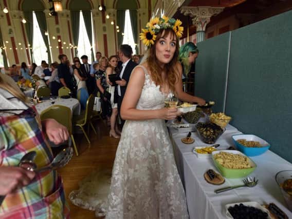 Newly-wed environmentalist couple Kayley Cookson and Joe Tilston used food destined for the bin to instead cater for their entire wedding. cc Guzelian Ltd Asadour Guzelian