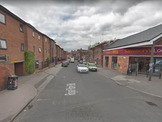A 21-year-old man has been stabbed after a man tried to rob him and a female friend at a cashpoint in Headingley.