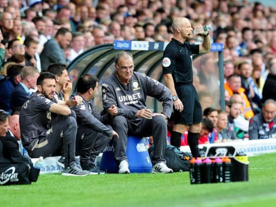 WE GO AGAIN: Head coach Marcelo Bielsa takes his seat backed by Leeds United's huge support for the club's first home game of the new season against Nottingham Forest.