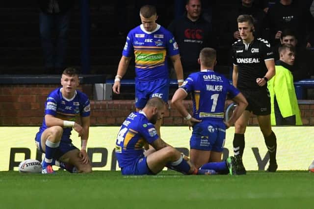 Leeds Rhinos players show their frustration against St Helens.