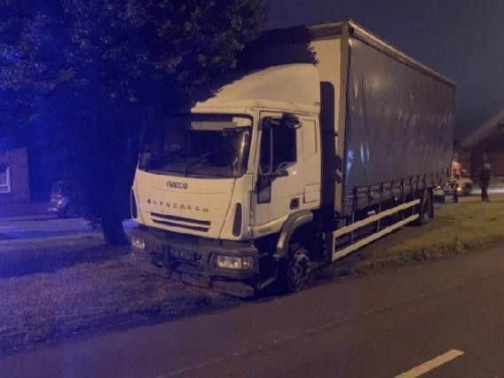 The HGV came to a stop on the central reservation of Belle Isle Road without its front two wheels.