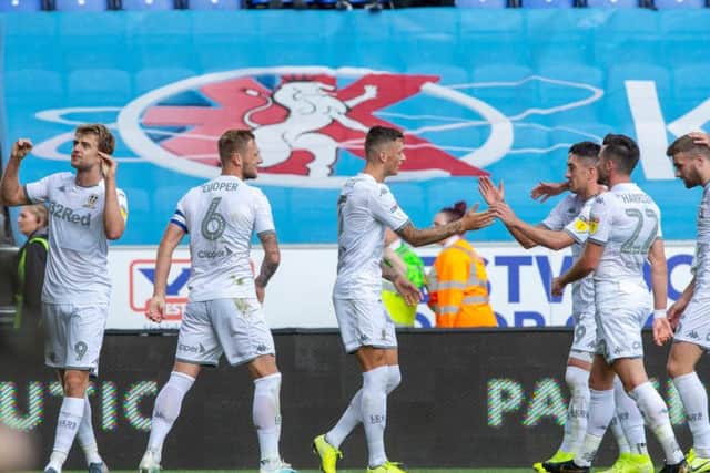 DOUBLE TROUBLE: Patrick Bamford, left, celebrates his and Leeds United's second goal in Saturday's 2-0 win at Wigan Athletic. Picture by Bruce Rollinson.