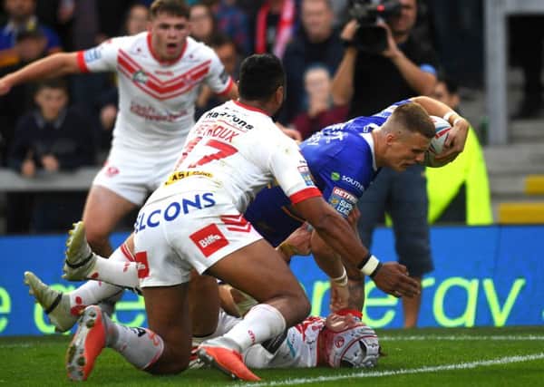 Ash Handley goes over to score against St Helens.