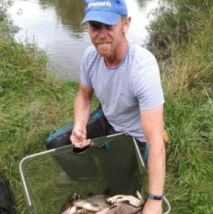 Leeds angler, Andy Jackson, with part of his winning 40-10 bream catch from the Ouse stump at Fulford.