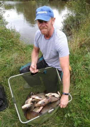 Leeds angler, Andy Jackson, with part of his winning 40-10 bream catch from the Ouse stump at Fulford.