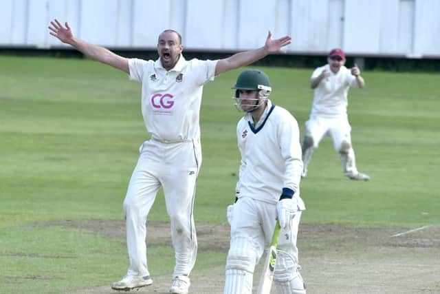 Ricky Halloran celebrates as he takes one of his four wickets for Hall Park, who went on to lose to hosts Kirkstall Educational by one wicket. PIC: Steve Riding