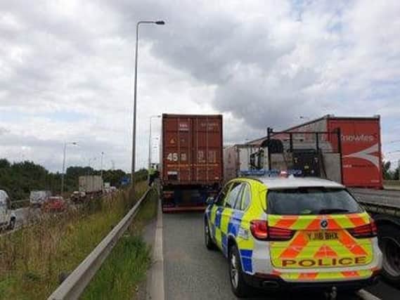Police trying to help a stranded motorist in a traffic jam were blocked by a lorry driver having a nap on the hard shoulder. Picture: WYP Roads Policing Unit
