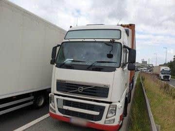 Police trying to help a stranded motorist in a traffic jam were blocked by a lorry driver having a nap on the hard shoulder. Picture: WYP Roads Policing Unit