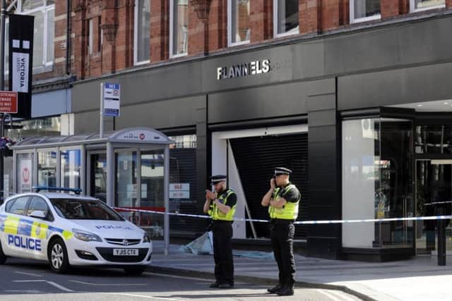 Scene of the ram raid on Flannels on Vicar Lane in Leeds city centre in June last year