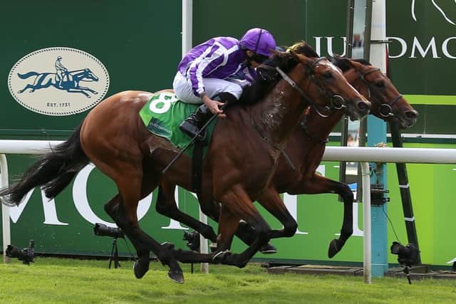 Japan and Ryan Moore (near side) got the better of Crystal Ocean in a thrilling renewal to the Juddmonte International.