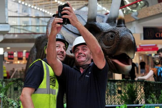 Workers grab a selfie at Merrion Centre.